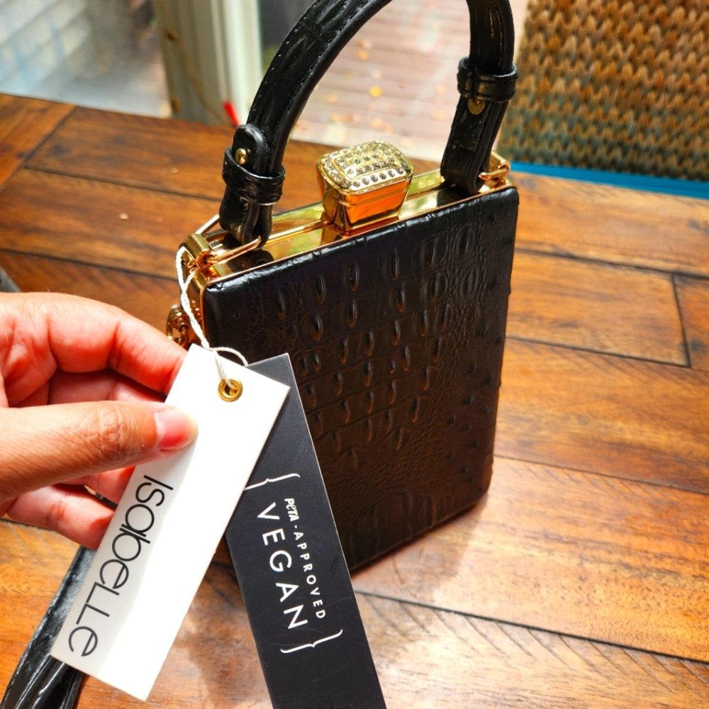 Isabelle NWT vegan crossbody/sachel blackwith handle and adjustable strap.